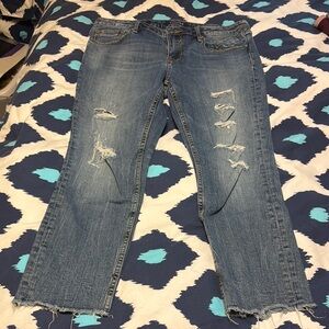 Distressed Mid-Blue Women’s Skinny Jeans